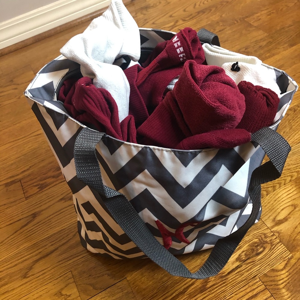 Bag full of maroon and white soccer socks